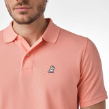 Polo Coral Logo Blanco