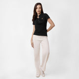 Polo Negra Entallada Logo Dorado para Mujer
