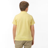 Polo Amarillo Claro Logo Blanco Niño