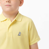 Polo Amarillo Claro Logo Blanco Niño