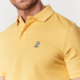 Polo Amarilla Logo Blanco